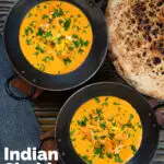 Overhead Indian shahi paneer curry in a creamy sauce served with naan bread featuring a title overlay.