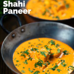 Indian shahi paneer curry in a creamy sauce served with fresh coriander featuring a title overlay.