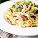 Creamy ham and mushroom tagliatelle with a creme fraiche and mustard sauce.