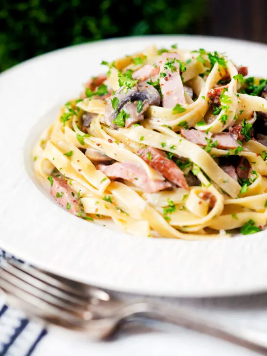 Creamy ham and mushroom tagliatelle with a creme fraiche and mustard sauce.