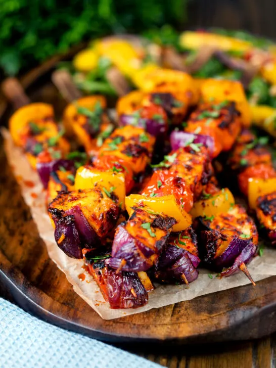 Harissa halloumi and vegetable kebabs served with a spicy mango salad.