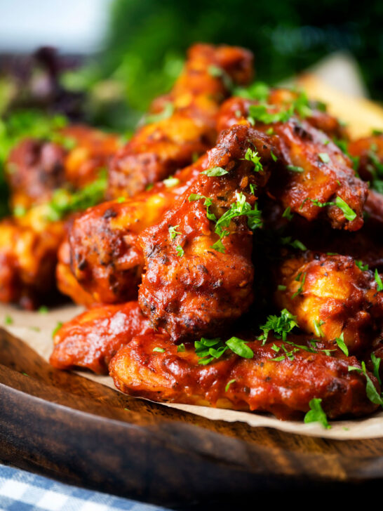 Spicy, sweet and sour sticky date and harissa chicken wings.