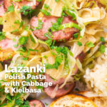 Overhead close-up Polish noodles or lazanki with kielbasa sausage. cabbage and sauerkraut featuring a title overlay.