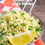 Plain buttered couscous with lots of chopped fresh herbs and a lemon wedge featuring a title overlay.