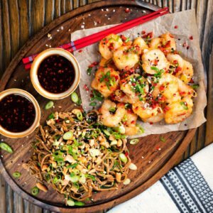 Salt and pepper prawns with a spicy dipping sauce served with a soba noodle salad.