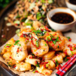 Chinese salt and pepper prawns with a chilli dipping sauce and soba noodle salad.
