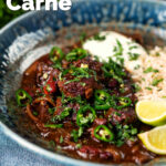 Chunky beef chilli con carne cooked in a slow cooker served with brown rice featuring a title overlay.