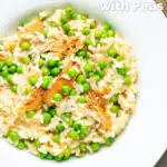 Overhead smoked mackerel risotto with sweet peas and chilli flakes featuring a title overlay.