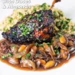 Tamarind and honey glazed duck leg with stewed onions, dates, almonds and buttered couscous featuring a title overlay.