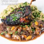 Tamarind and honey glazed duck leg with stewed onions, dates, almonds and buttered couscous featuring a title overlay.