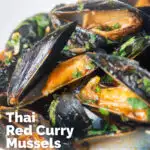 Close-up Thai inspired red curry mussels in a coconut milk sauce featuring a title overlay.