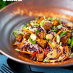 Crispy soy sauce tofu and rice vermicelli noodle salad with lots of veggies featuring a title overlay.