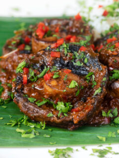 Close-up vegan mushroom rendang curry with coconut milk.