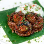 Vegan mushroom rendang curry with coconut milk.