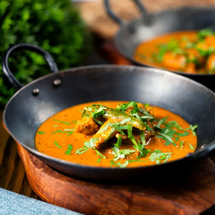 South Indian influenced coconut chicken curry with tamarind served in an iron karai.
