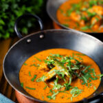 Indian coconut milk chicken curry with tamarind and fresh coriander.