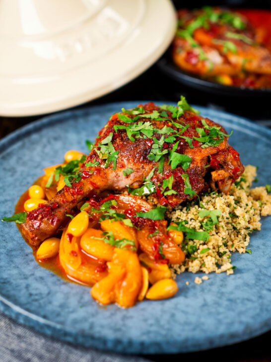 Duck leg tagine with Moroccan flavours served with buttered couscous and fresh coriander.