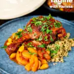 Duck leg tagine with Moroccan flavours served with buttered couscous and fresh coriander featuring a title overlay.