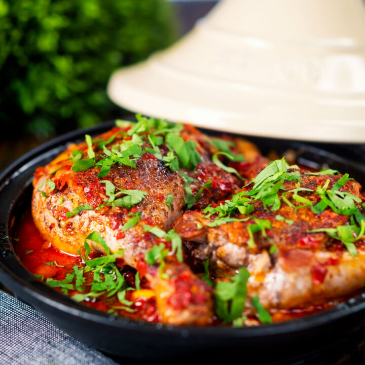 Moroccan influenced duck leg tagine with rose harissa, almonds and dried apricots.