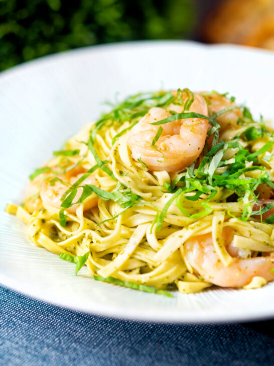 Prawn pesto pasta with linguine and fresh basil.