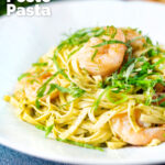 Prawn pesto pasta with linguine and fresh basil featuring a title overlay.