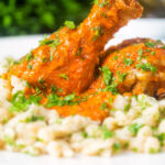 Hungarian chicken paprikash in a sour cream and paprika sauce with dumplings.