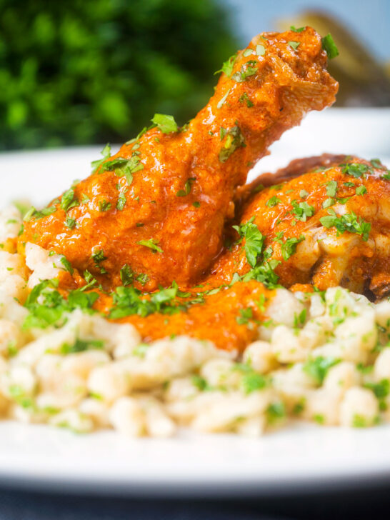 Hungarian chicken paprikash in a sour cream and paprika sauce with dumplings.