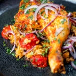 Indian influenced one pot baked chicken legs and basmati rice.