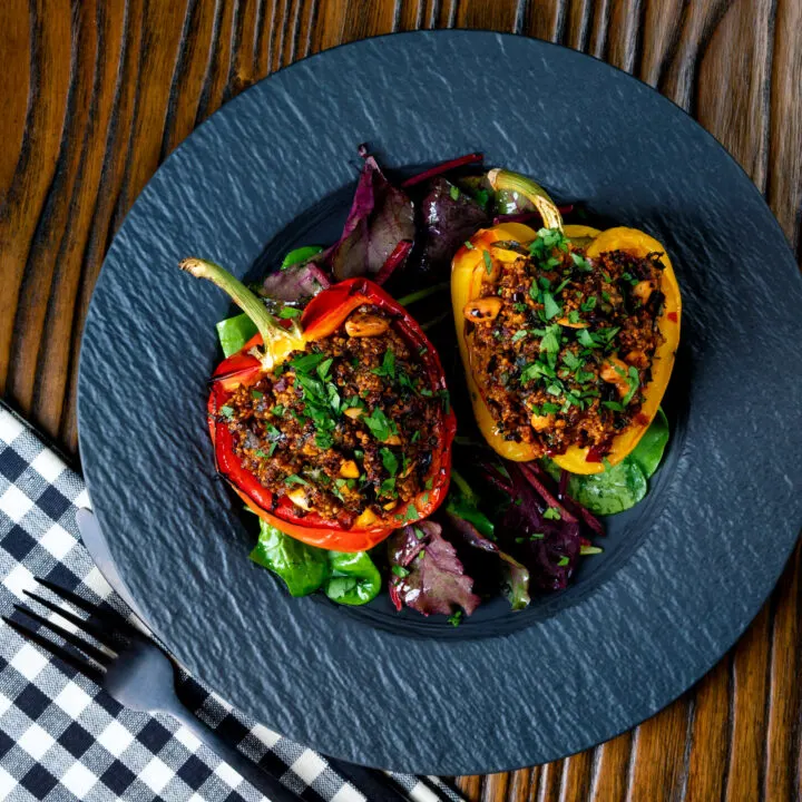 Harissa flavoured minced lamb stuffed peppers with almonds and couscous.