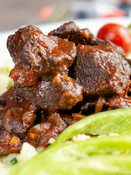Close-up Hungarian marha porkolt beef stew with nokedli.