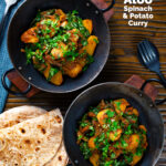 Overhead spinach and potato curry or saag aloo served with homemade chapatis featuring a title overlay.