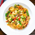 Overhead curried Singapore chow mein noodles with chicken and prawns.