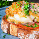 Close-up smoked haddock rarebit on toast with tomatoes garnished with chives featuring a title overlay.