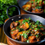 Vegan spinach (saag) and mushroom Indian inspired curry.