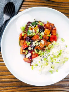 Overhead vegan sweet and sour tofu served with rice.