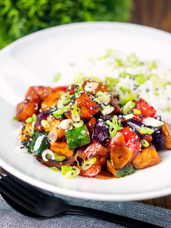 Vegan sweet and sour tofu with pineapple, veggies and rice.