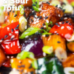 Close-up vegan sweet and sour tofu with pineapple and veggies featuring title overlay.