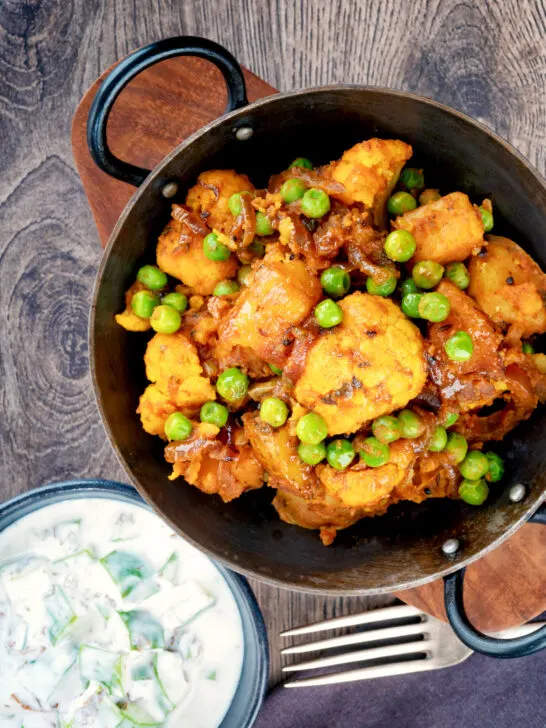 Overhead aloo gobi matar an Indian potato, cauliflower and pea curry.