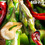Close-up asparagus stir fry with soy sauce garlic and chilli featuring a title overlay.