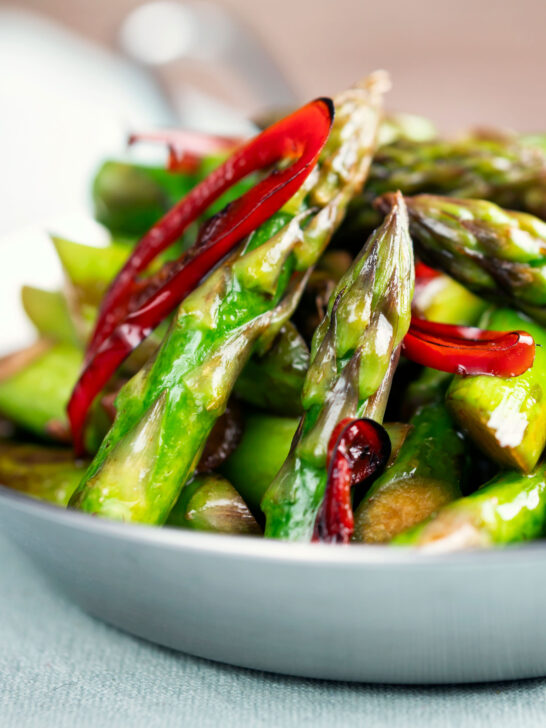 Stir fried asparagus with soy sauce, garlic and chilli.