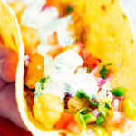 Beer battered crispy cod fish tacos in a corn tortilla.