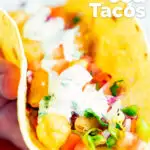 Beer battered crispy cod fish tacos in a corn tortilla featuring a title overlay.