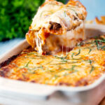 Portion of beef stuffed cannelloni with a bechamel topping removed from a baking dish featuring a title overlay.