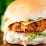Buttermilk fried chicken burger with a bitter chicory slaw and chipotle mayonnaise.