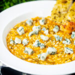 Roasted butternut squash and sage risotto served with Roquefort cheese.