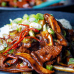 Close up Chinese beef and shiitake mushroom stir fry.