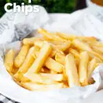 Chip shop style chippy chips served with a side of curry sauce featuring a title overlay.
