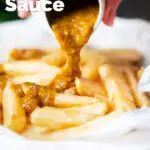 Homemade British chippy curry sauce being poured over chip shop chips featuring a title overlay.