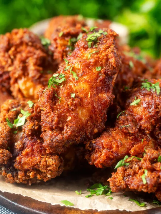 Close-up crispy fried spicy buttermilk chicken wings.