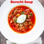 Overhead homemade borscht soup with beetroot, beef and cabbage served with sour cream featuring a title overlay.